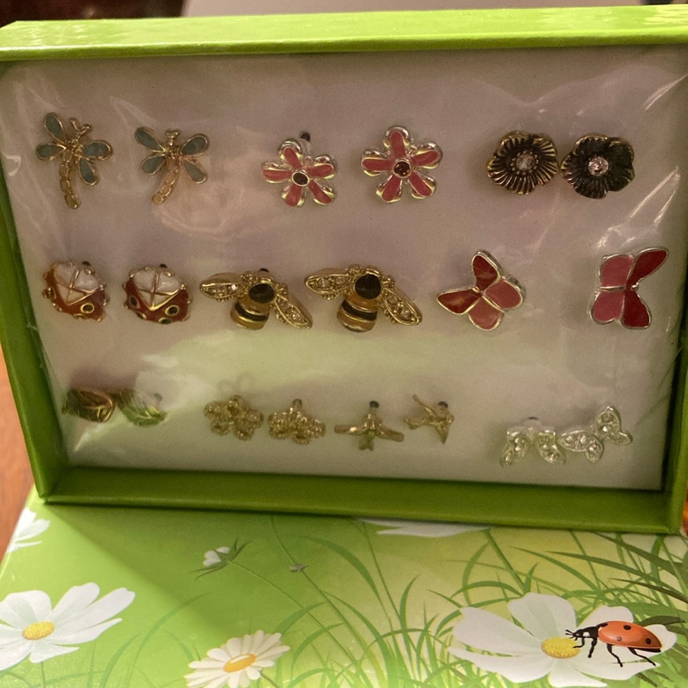 Avon stud earrings. 10 pair in box.  Botanical and bug, bird designs. New.